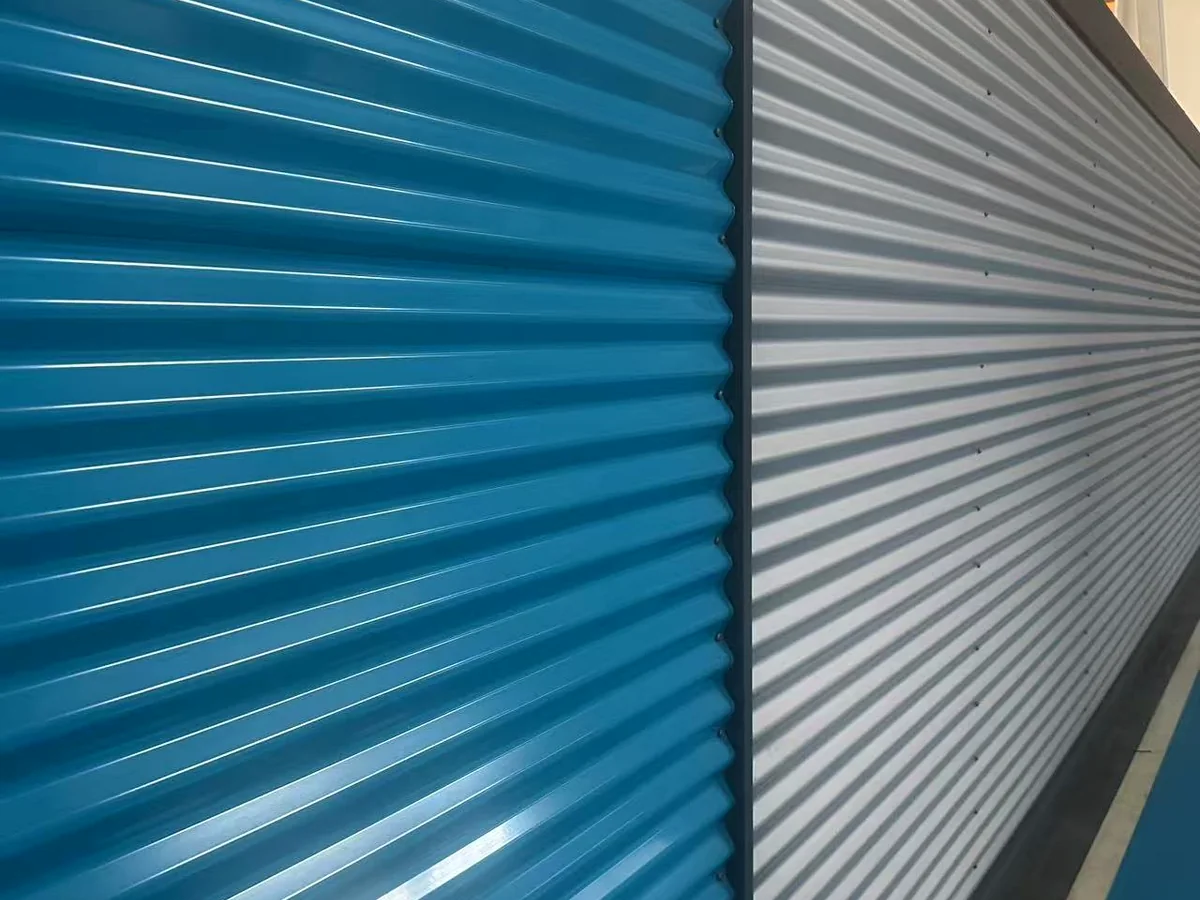 Blue and grey corrugated coated steel wall and roofing panels